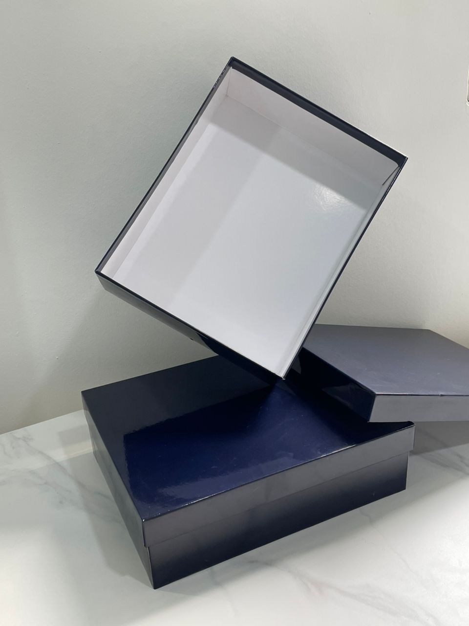 Glossy navy blue box